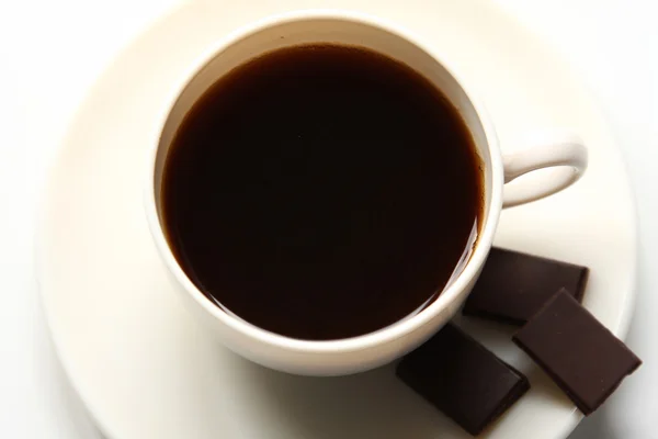 Coffee cup and chocolate bars — Stock Photo, Image
