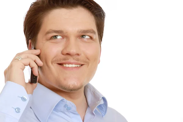 Hombre de negocios con un teléfono móvil — Foto de Stock