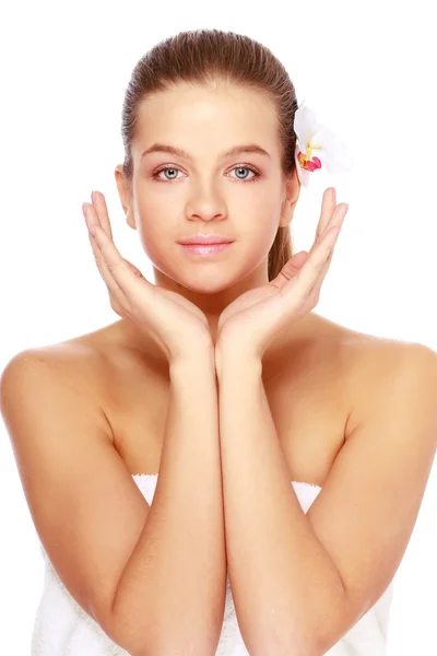 Young woman touching her face — Stock Photo, Image