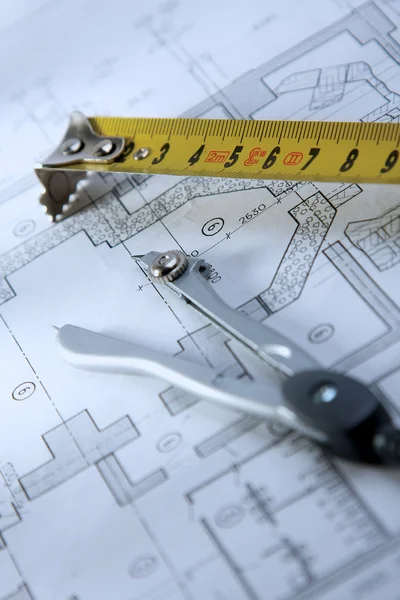 Engineer's work table with drawings and tools — Stock Photo, Image