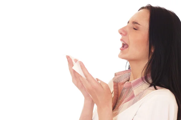 Woman sneezes — Stock Photo, Image