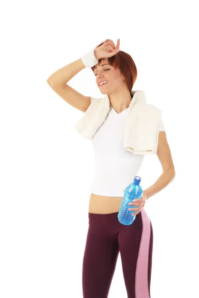 Şişe su ve havlu ile sportwoman — Stok fotoğraf