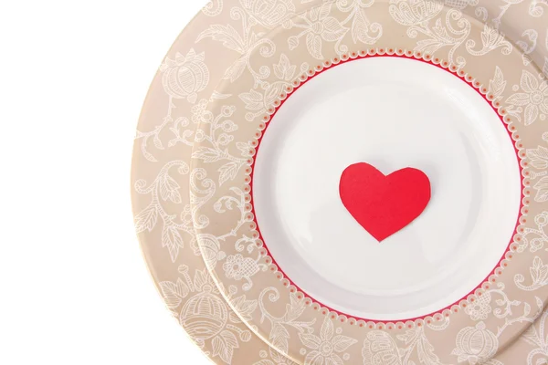 Punainen sydän lautasella — kuvapankkivalokuva