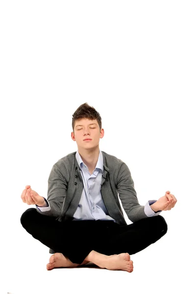 Joven chico guapo meditando — Foto de Stock