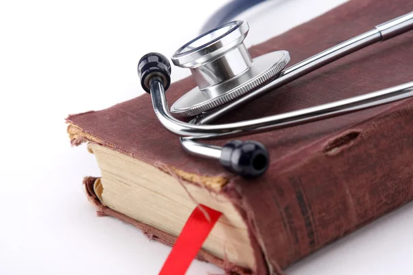 Stethoscope on a book — Stock Photo, Image