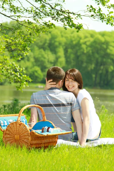 Young couple having picnic — Stock Photo, Image