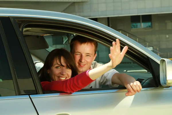 Young couple in the car — Stock Photo, Image