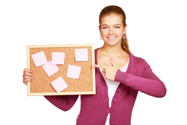 Young woman holding a board — Stock Photo, Image