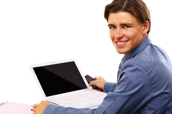 Zakenman voor een laptop — Stockfoto