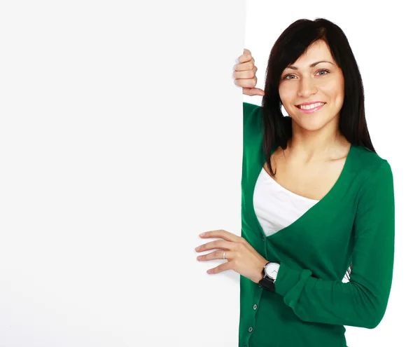 Jonge vrouw met lege bestuur banner — Stockfoto