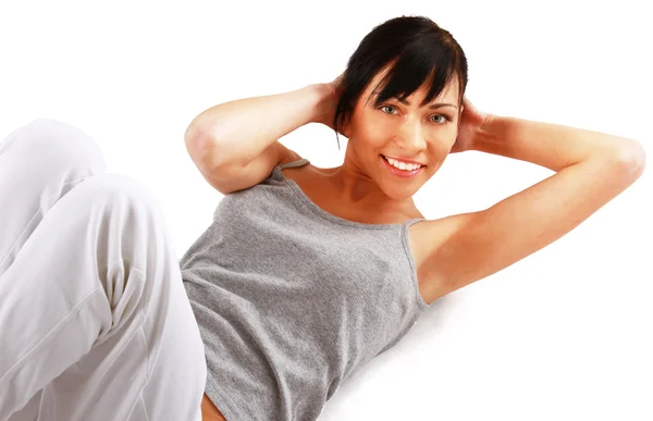 Woman doing strength exercises — Stock Photo, Image