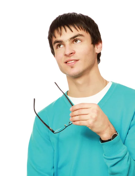 Joven sosteniendo gafas — Foto de Stock