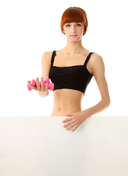 Woman with dumbbells in her hands — Stock Photo, Image