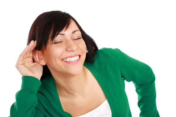 Mujer joven escuchando — Foto de Stock