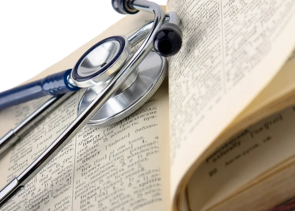 Stethoscope on a book — Stock Photo, Image