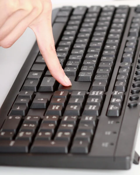 Woman's hand on keyboard — Stock Photo, Image