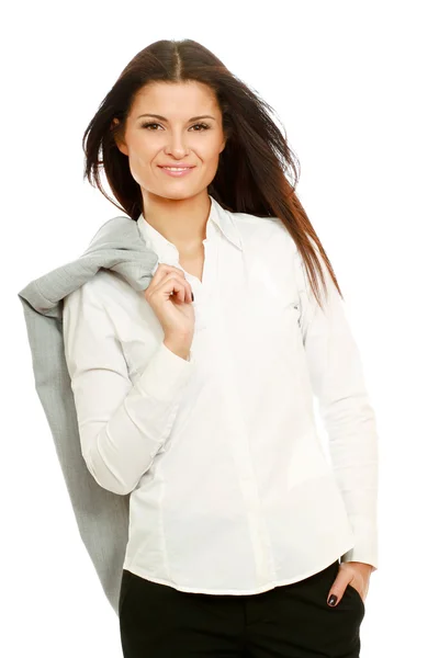 Affärskvinna som står med en jacka — Stockfoto