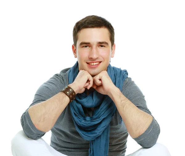 Young man sitting on floor — Stock Photo, Image