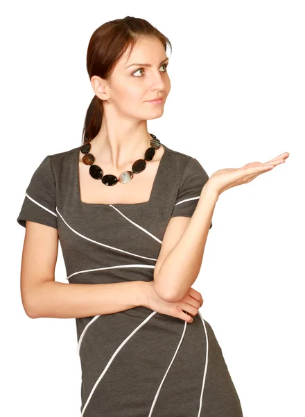 Woman pointing at a copyspace — Stock Photo, Image