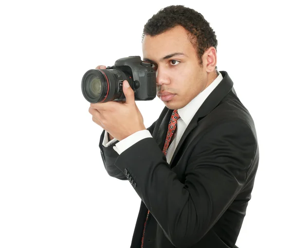 一个专业的摄影师，在白色背景上孤立 — 图库照片