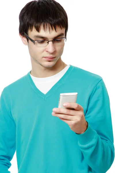 Ung kille med en mobiltelefon — Stockfoto