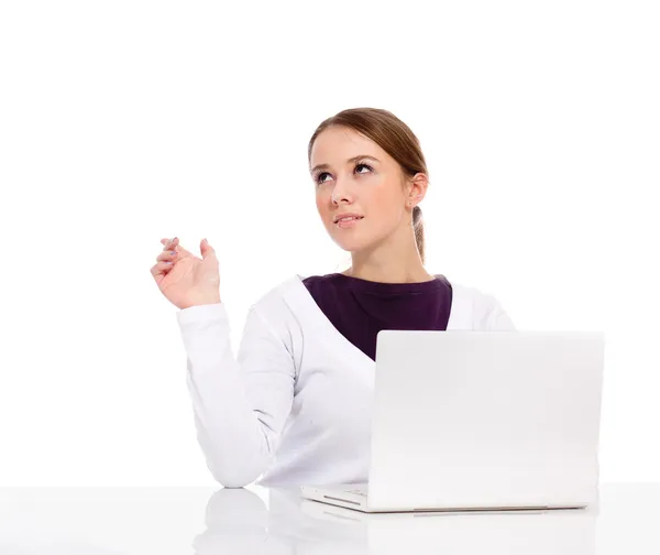 Femme d'affaires avec ordinateur portable, pointant vers le haut — Photo