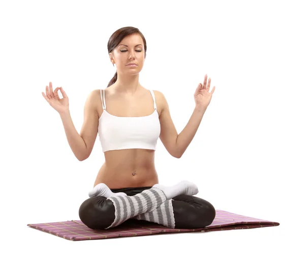 Young woman doing yoga — Stock Photo, Image