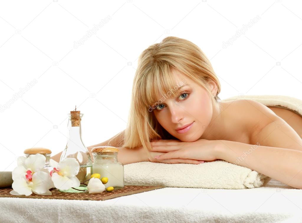 Young beautiful woman in spa environment