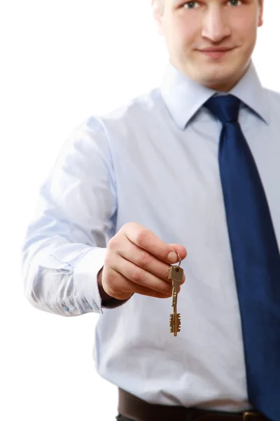 Male hands giving keys — Stock Photo, Image