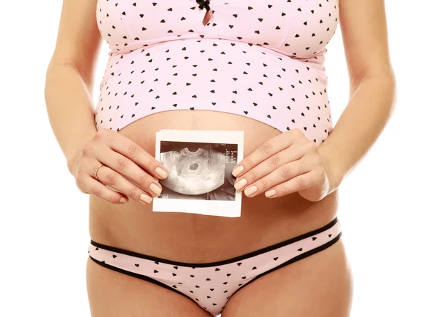 Těhotná žena držící ultrazvuk obrázek — Stock fotografie