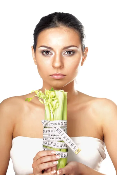 Mujer con verduras y cinta métrica — Foto de Stock