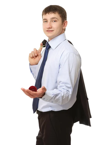 Young man holding a small box — Stock Photo, Image