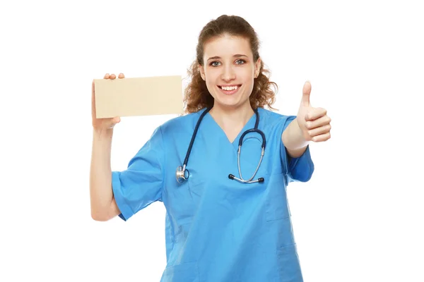 Ärztin mit einem Blanko, das ok zeigt — Stockfoto