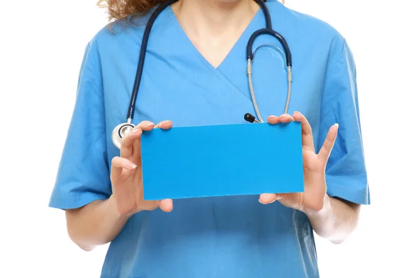 Una doctora sosteniendo un blanco — Foto de Stock