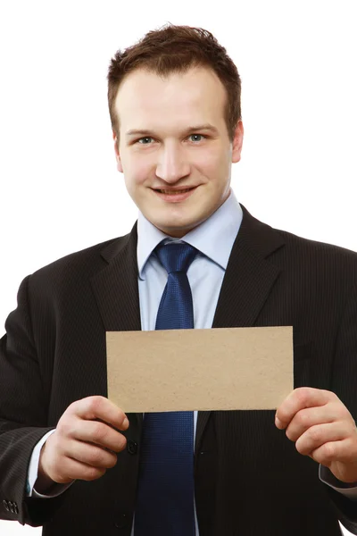 Businessman holding a blank — Stock Photo, Image