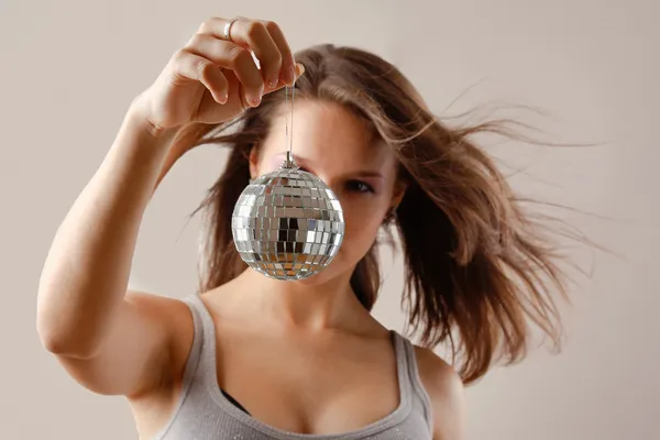 Girl with disco ball — Stock Photo, Image