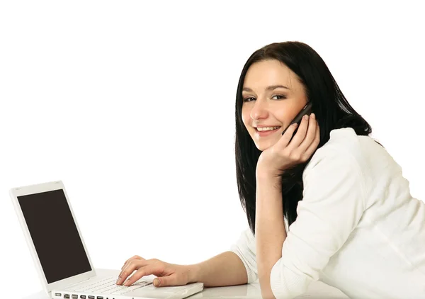 Femme d'affaires avec ordinateur portable et téléphone — Photo