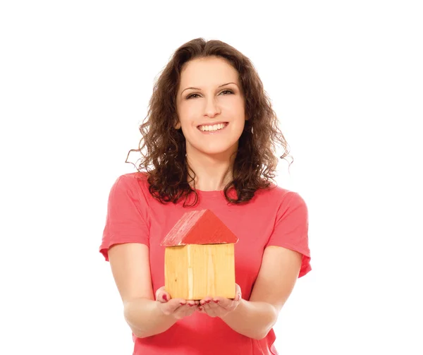 Young woman with toy house — Stock Photo, Image