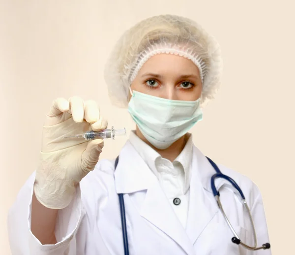 Medical doctor with syringe — Stock Photo, Image