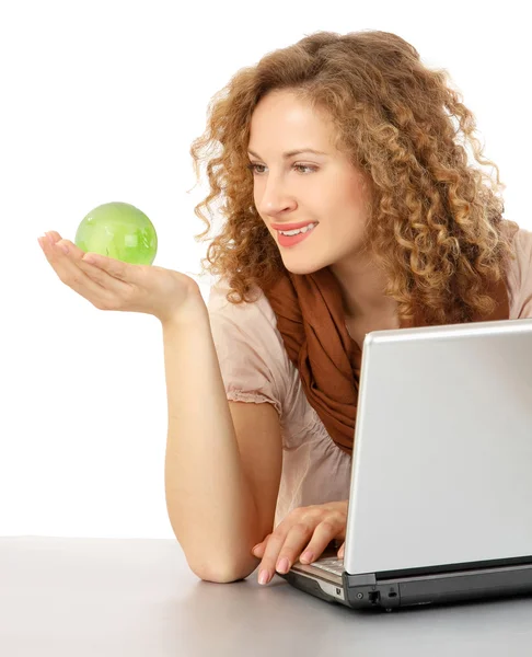 Globe in the hand and laptop — Stock Photo, Image
