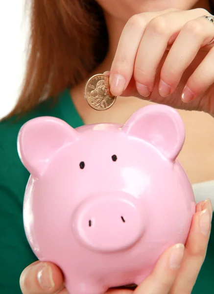 Young woman with piggy bank (money box) — Stock Photo, Image
