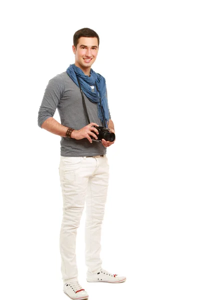 Young photographer with a camera — Stock Photo, Image