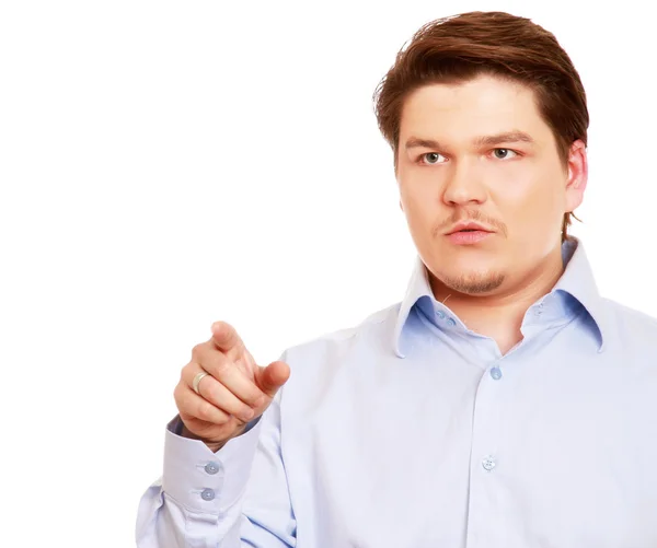 Young man pointing at something — Stock Photo, Image