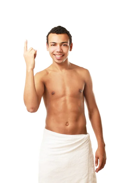 Nude man covering himself with a towel — Stock Photo, Image