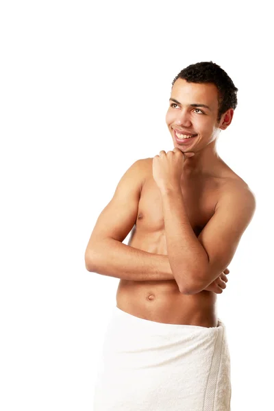 Nude man covering himself with a towel — Stock Photo, Image