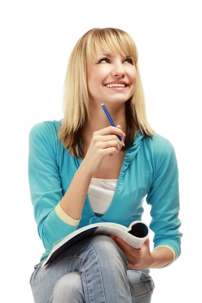 College meisje met een pen en een leerboek — Stockfoto