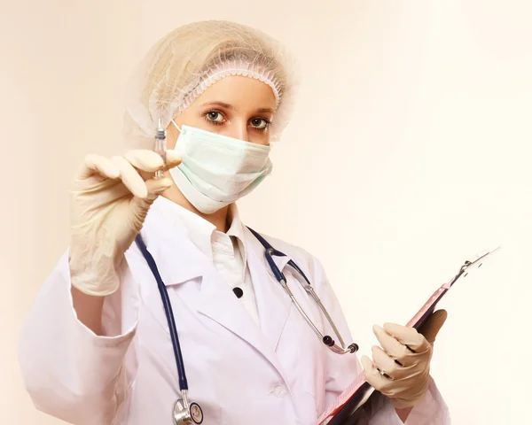 Medical doctor with syringe — Stock Photo, Image