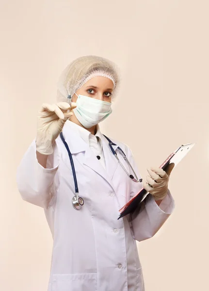 Medical doctor  with syringe — Stock Photo, Image