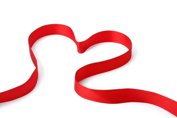 A red ribbon shaping heart — Stock Photo, Image