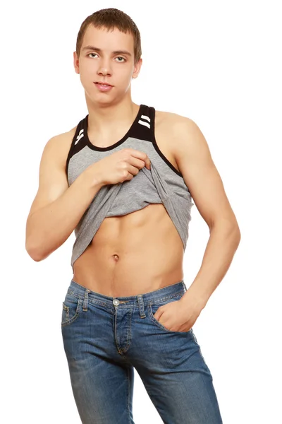 Muskulöser Mann zeigt seinen Bauch — Stockfoto